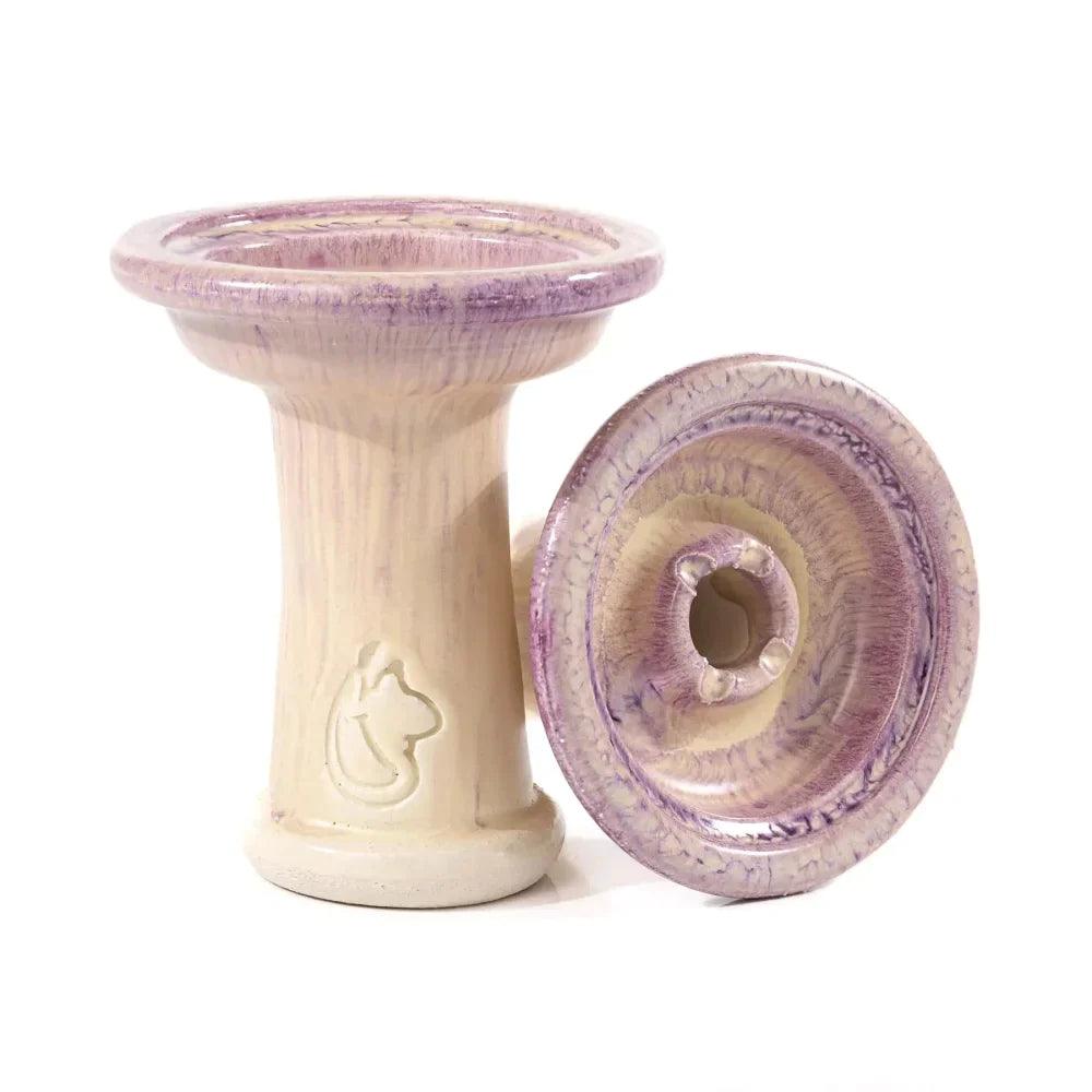 Dschinni Shisha Phunnel Royal Schamottstein Morado in lila. Es ist ein stehender und ein liegender Phunnel abgebildet. Das Dschinni Symbol ist zu sehen.