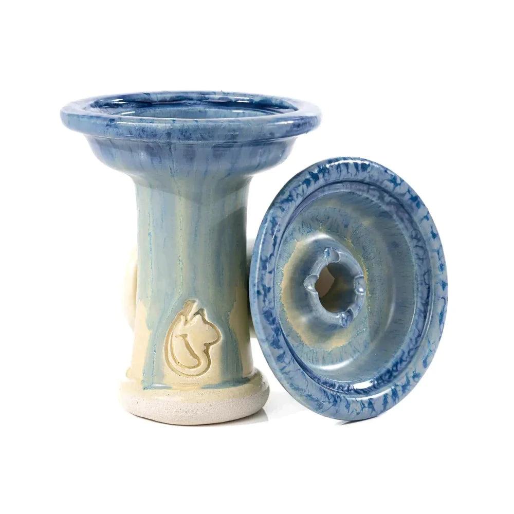 Dschinni Shisha Phunnel Royal Schamottstein Azul in blau. Es ist ein stehender und ein liegender Phunnel abgebildet. Das Dschinni Symbol ist zu sehen.