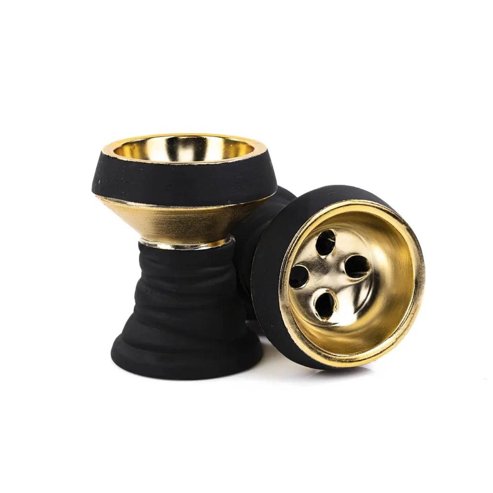 Dschinni Steinkopf in schwarz und gold. Es ist ein stehender und ein liegender Phunnel abgebildet.